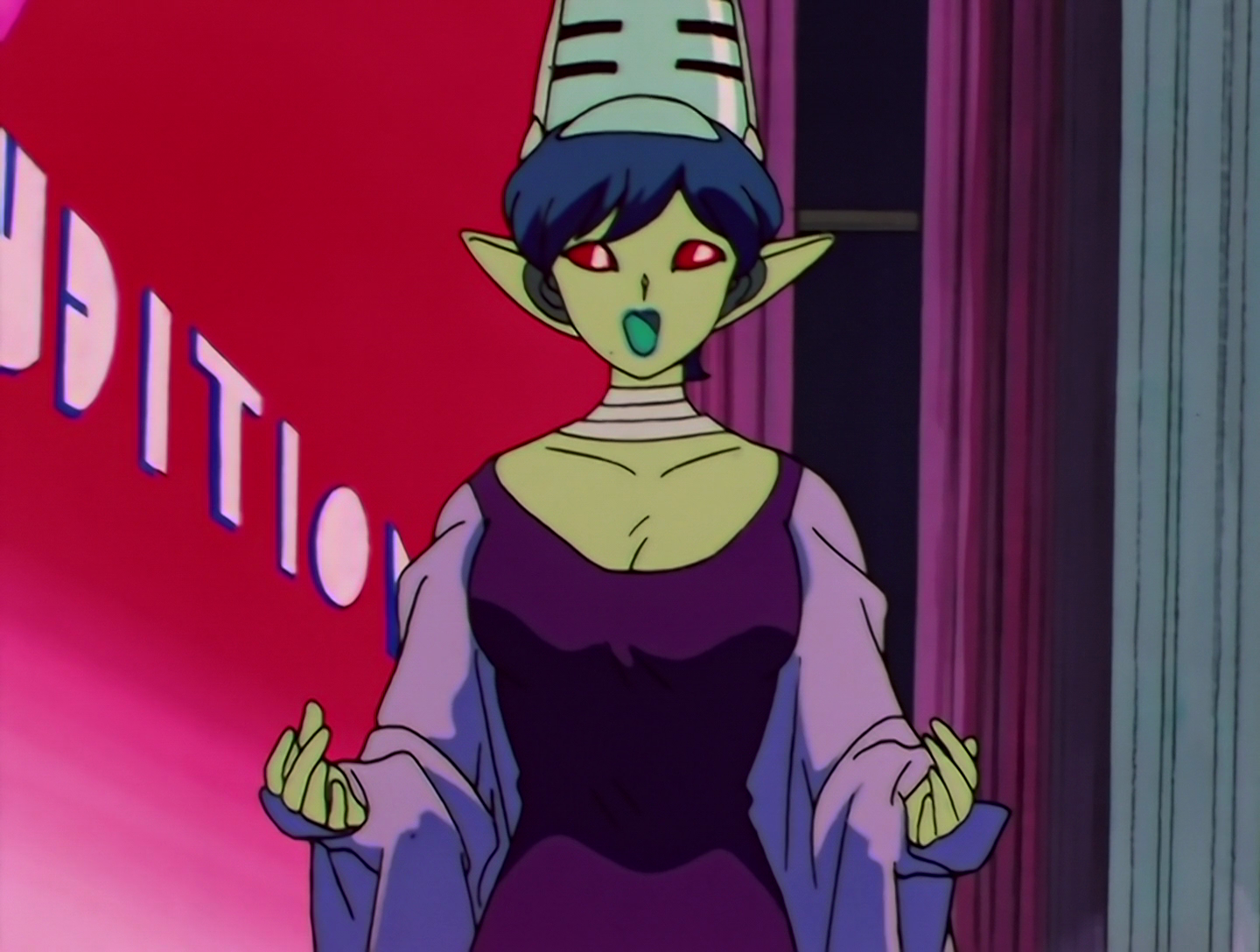 U-Tahime, a Daimon from Sailor Moon episode 114. She has green skin, red eyes and short blue hair. She wears a purple dress with a lilac cape and sleeves, and has a hat resembling a metal microphone. She’s looking very earnestly at the viewer.